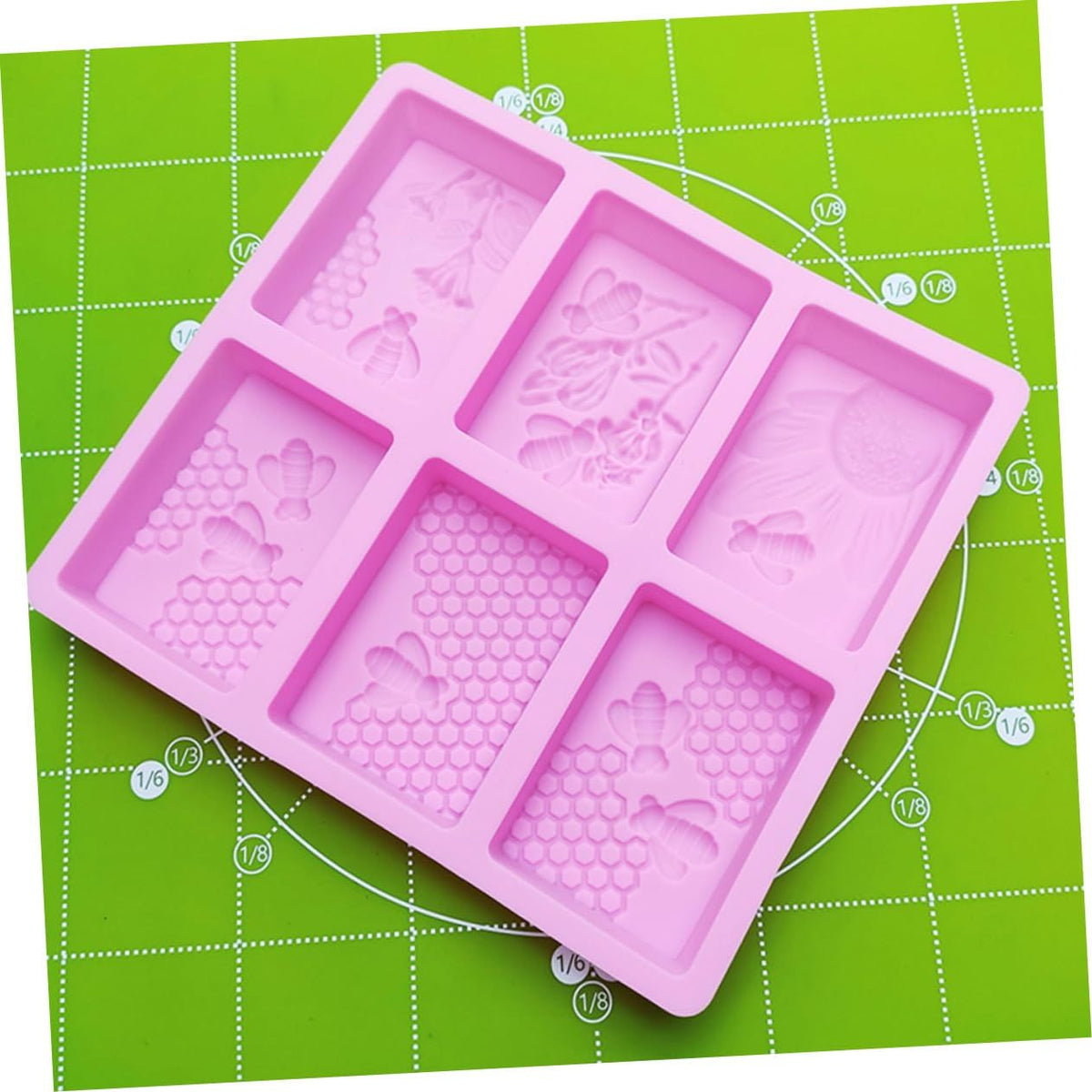 Bee soap silicone fondant mold with honeycomb beehive design for cake, ice cubes, chocolate, cookies, mousse, and pudding.