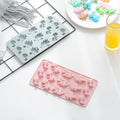 Silicone dinosaur-shaped candy mold by Everything Baby, non-stick food-grade tray for making fun dinosaur treats for kids.
