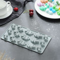 Dinosaur-shaped chocolate silicone mold by Everything Baby, non-stick food-grade baking tray for homemade kids' treats and pretend play.