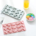 Silicone dinosaur-shaped chocolate mold from Everything Baby, non-stick food-grade tray for homemade kids’ treats and pretend play.
