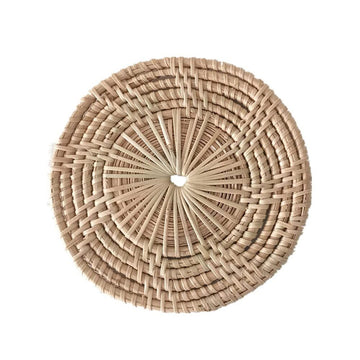 Handmade rattan coaster set with woven natural rattan for drinks, featuring rustic farmhouse boho wicker design.