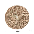 Handmade natural rattan coaster with woven design, ideal for drinks, featuring a retro rustic boho farmhouse style.