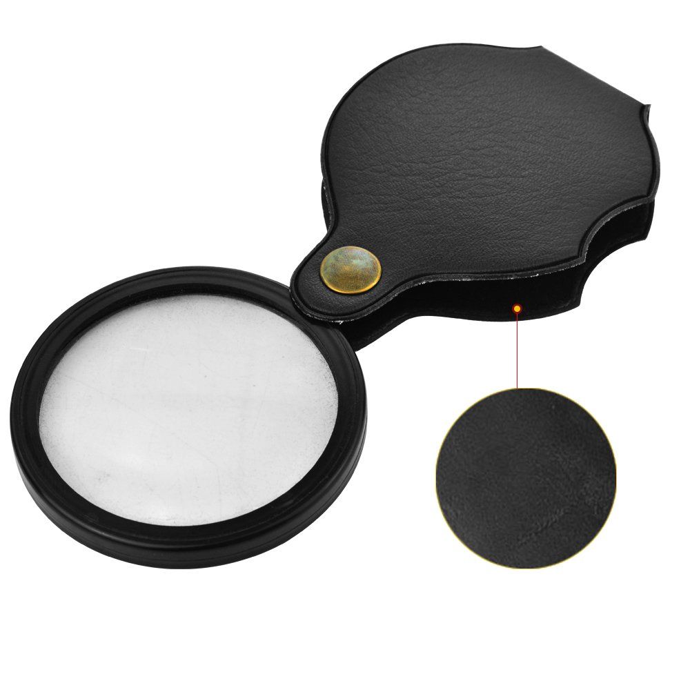 Black folding pocket magnifier loupe with rotating leather holster, 70mm for reading, science, and hobbies.