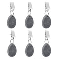 Six teardrop-shaped tablecloth weight pendants with metal clips from Everything Baby, used to secure table covers during family meals.