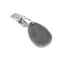 Six teardrop-shaped tablecloth weight pendants with metal clips, designed to secure table covers during family gatherings.