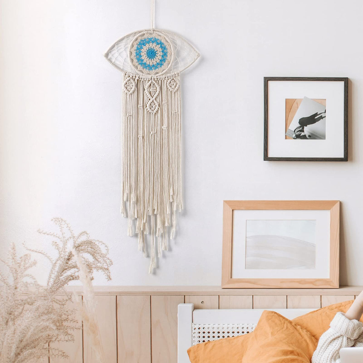 Beige large boho dream catcher with evil eye design, macrame wall hanging for bedroom or home decor, woven ornament.
