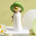 Cute kids statue for shelf decor, resin figurine of a baby blowing bubbles, ideal for boys and girls' pretend play room decor.