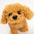 Realistic battery-operated toy puppy that walks and barks, designed for kids, featuring soft plush and electronic barking sounds.