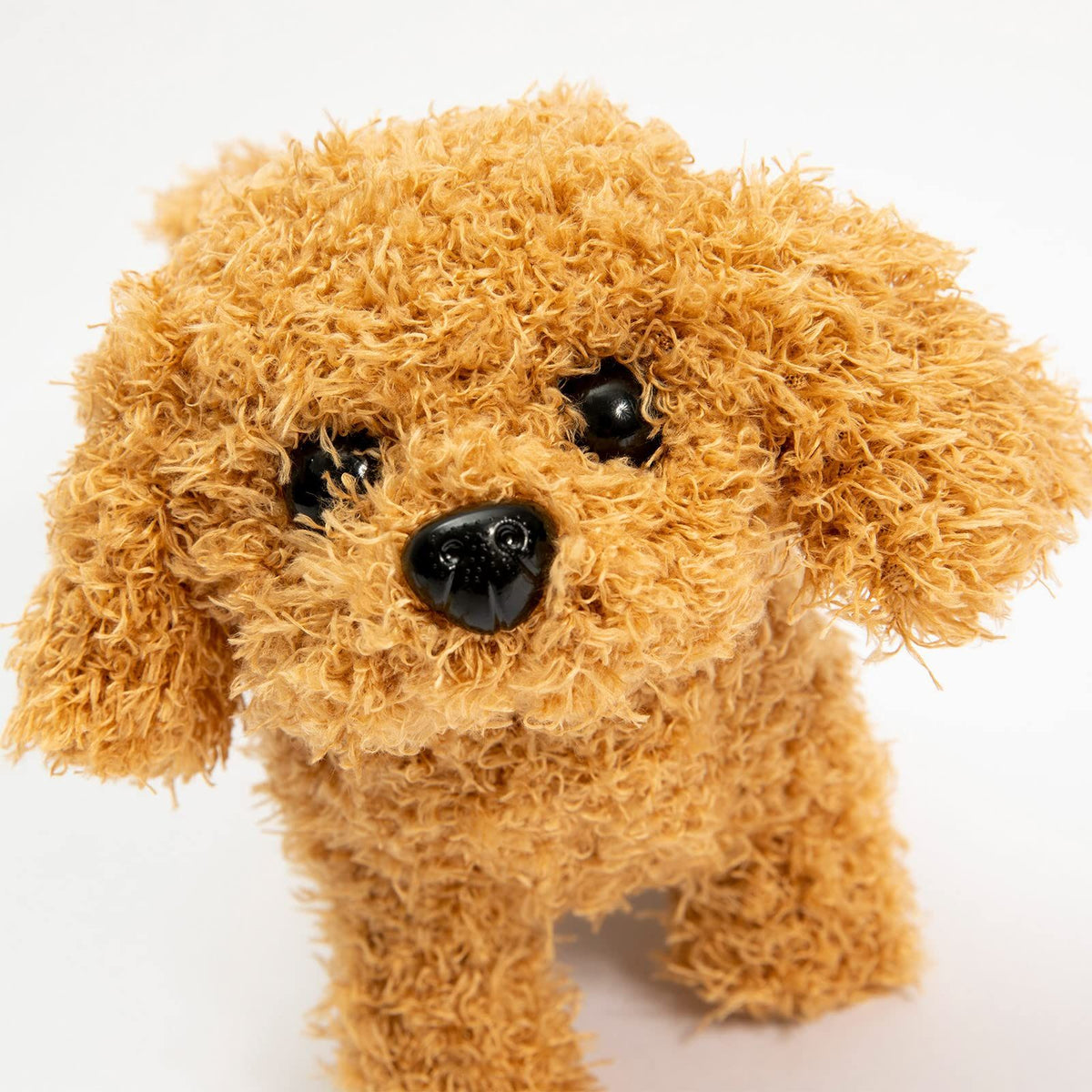 Realistic battery-operated toy puppy that walks and barks, designed for kids, featuring soft plush and electronic barking sounds.