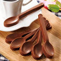 Silicone spoon-shaped chocolate mold for baking, soap, candle making, and cake decorating, suitable for baby and kids themed crafts.