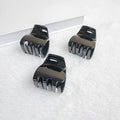 Three black jaw clips for thick hair, non-slip mini oval hair claws for women and girls, from Everything Baby.