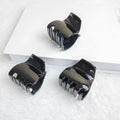 Three black jaw clips for thick hair, non-slip mini oval hair claws from Everything Baby, ideal for women and girls' hair styling.