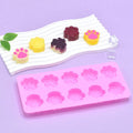 Two silicone cat paw molds for baking and treats, food-grade non-stick silicone, perfect for making fun shapes for kids and pets.