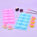 Two silicone cat paw molds for baking and treats, food-grade, non-stick, flexible silicone molds for baking and craft projects.