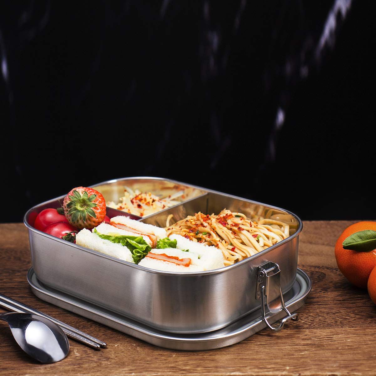 Stainless steel bento box lunch container with three compartments, leakproof design, for adults and kids, by Everything Baby.