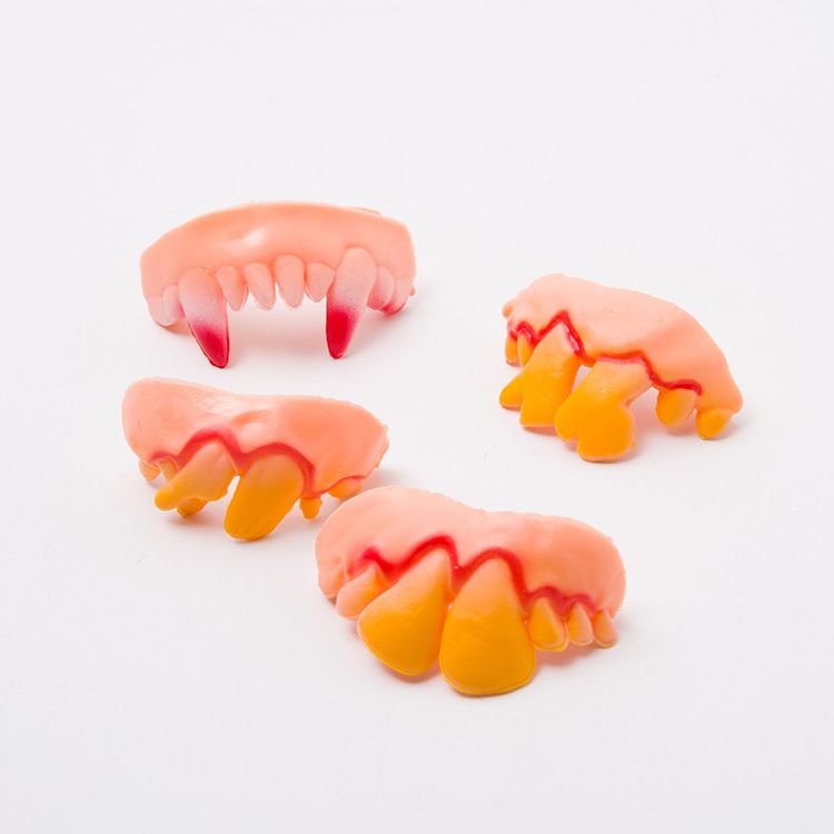 Set of 10 plastic vampire fangs for kids Halloween costume, fake teeth with realistic appearance for spooky themed parties