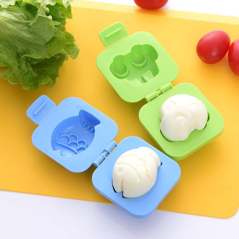 Eight-piece cartoon baby and kid's egg mold set including fish, car, and heart shapes for sushi, rice, and fondant decorating.