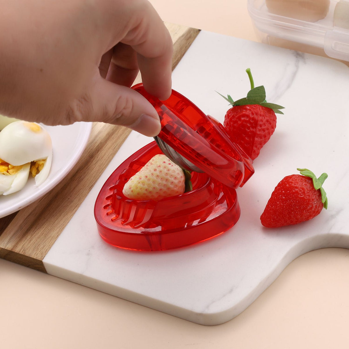 Mini strawberry slicer in stainless steel for cakes, pies, and decorations, ideal for home kitchen DIY food prep.