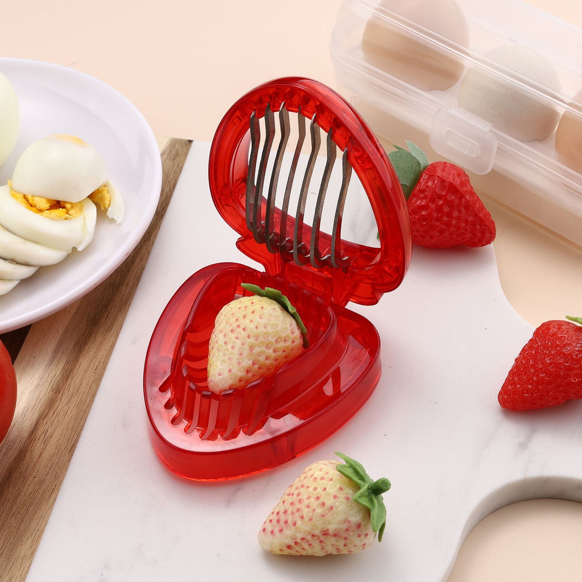 Stainless steel kitchen mini strawberry slicer from Everything Baby, ideal for cakes, pies, and fruit decorations.