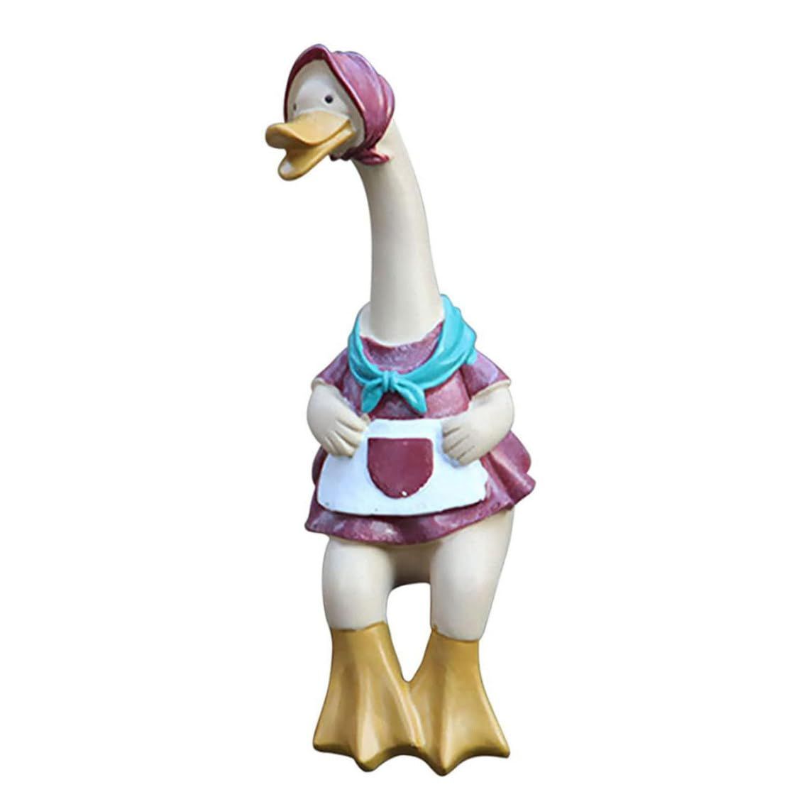 Resin outdoor garden statue of a cute duck couple, decorative yard art for lawn and garden decoration.