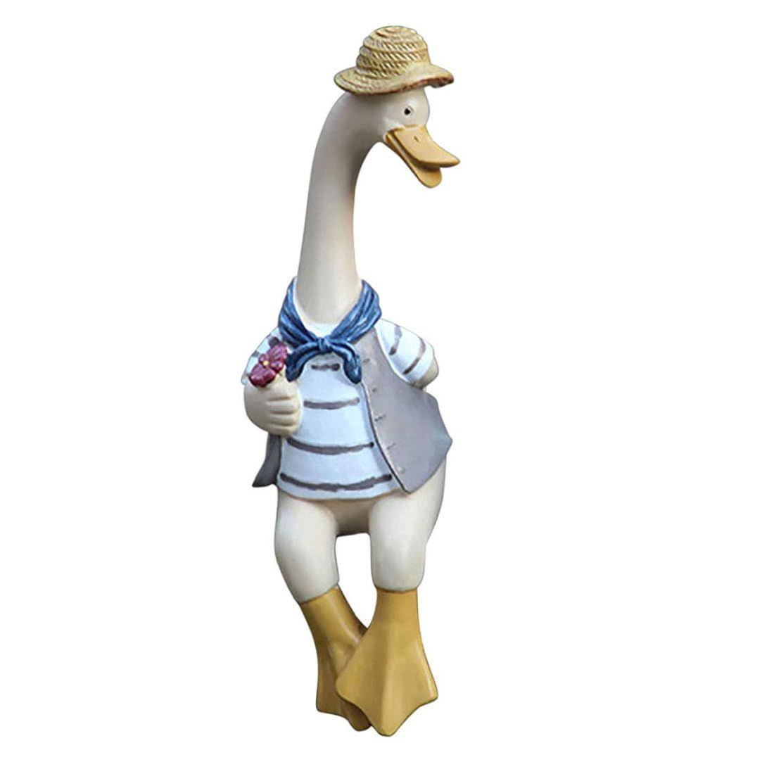 Resin outdoor garden statue of a couple of ducks, yard art decor perfect for lawn or outdoor play area.