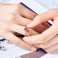 Pair of women's birthstone crystal thumb rings featuring personalized open design with matching fashion style.
