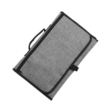 Portable baby diaper changing pad with a leading pad, ideal for travel and families, from Everything Baby.