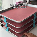 Eight-piece Ray Stacker set for baking sheets and trays, ideal for organizing snacks, drying, and space-saving in the kitchen.