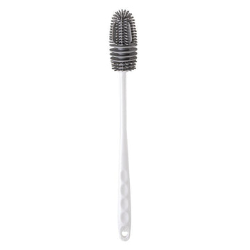 Silicone washing cup brush with long handle for baby bottles and cups, designed for thorough cleaning without dead corners.