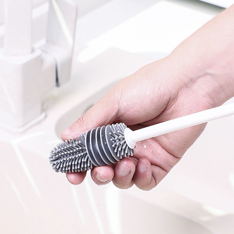 Silicone baby bottle brush with long handle from Everything Baby, designed for thorough cleaning without dead corners.