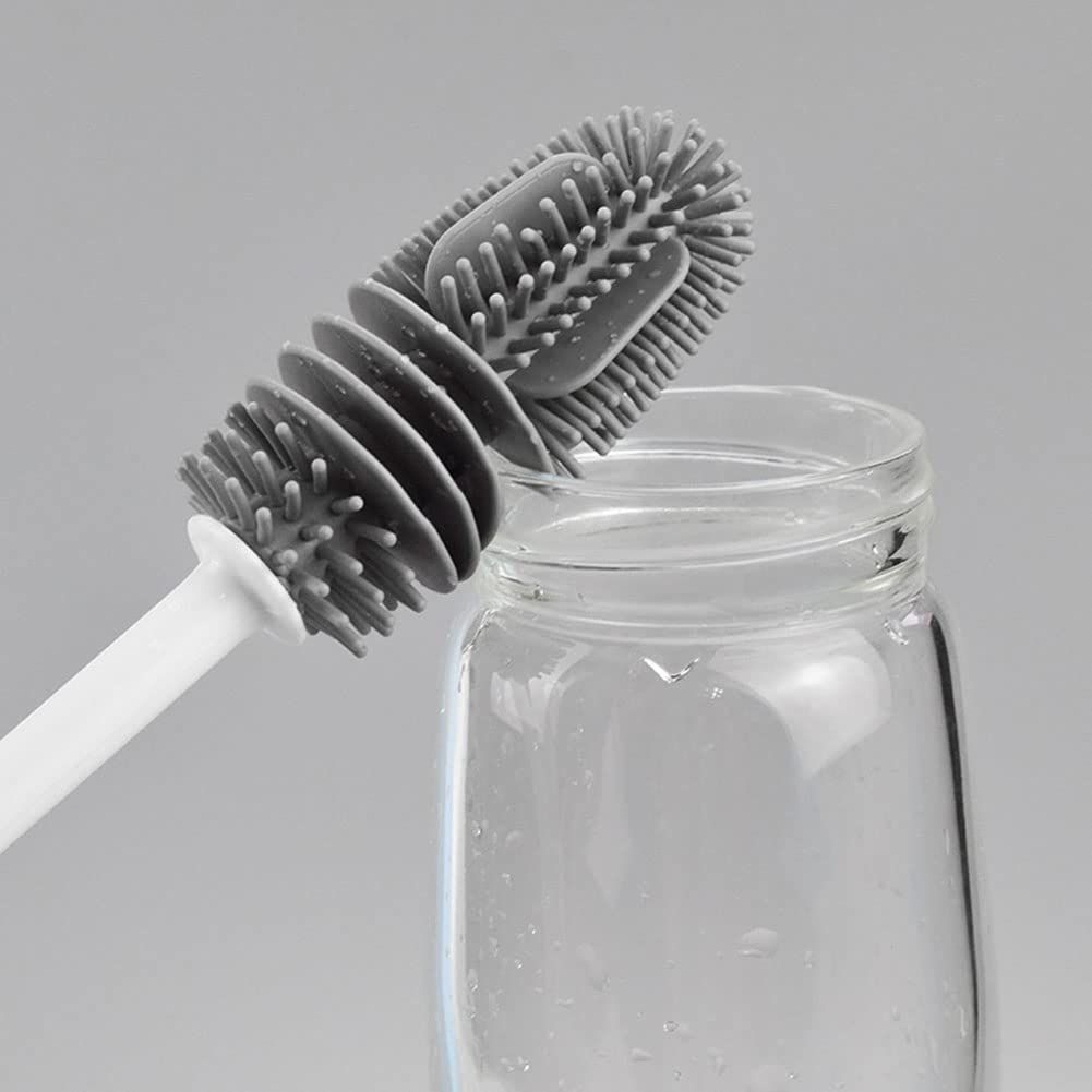 Silicone baby bottle brush with long handle from Everything Baby, designed for thorough cleaning without dead corners.