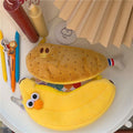 Cute plush banana and chicken leg zipper pencil case with soft padding, fun face design, ideal for kids and nursing accessories.