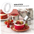 Adjustable circular baking mold with chocolate and fruit design, ideal for baking pies, biscuits, and soft candies.