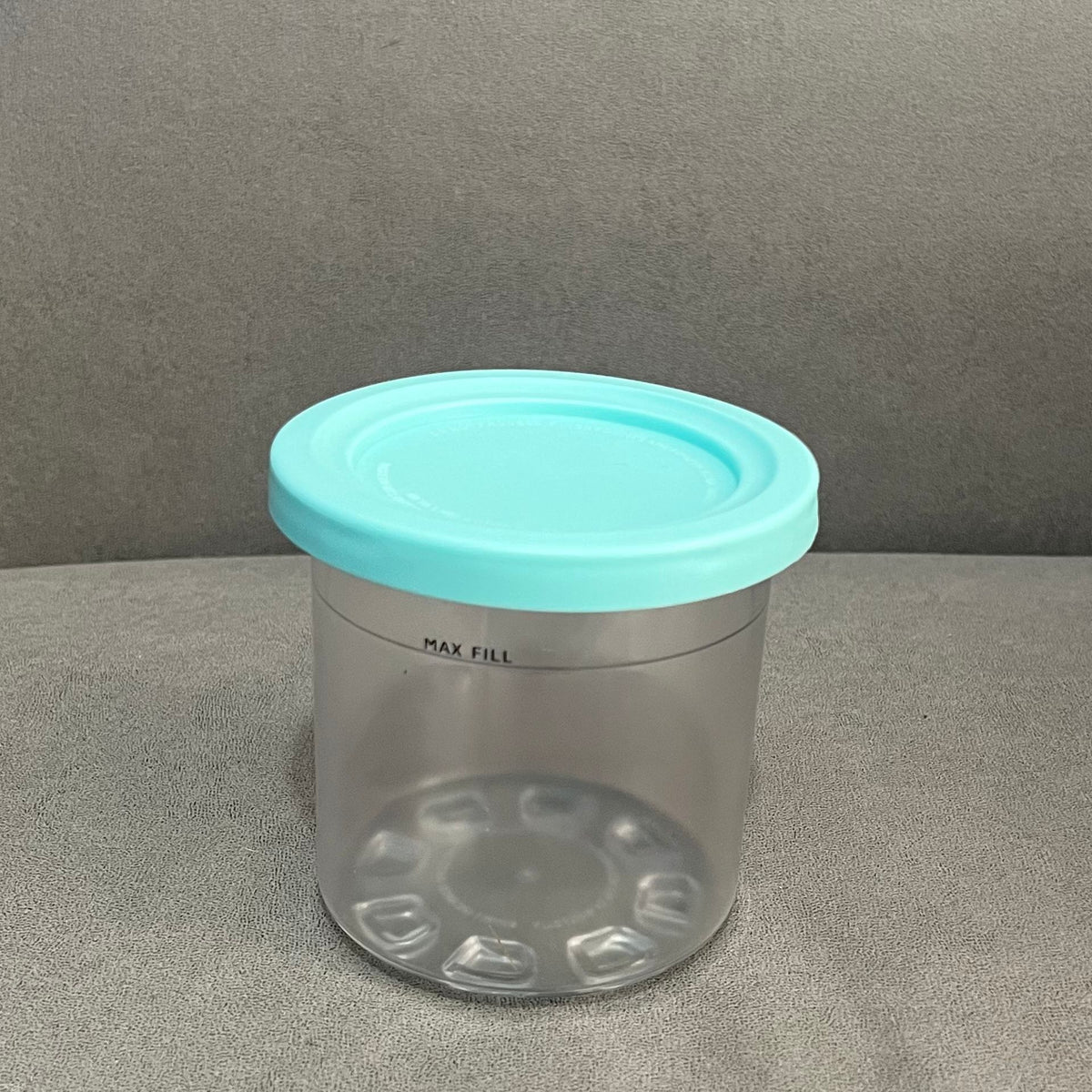 Colorful ice cream storage jar with dishwasher-safe lid in transparent, gray, stone gray, pink, and water green, ideal for kids' lunch.