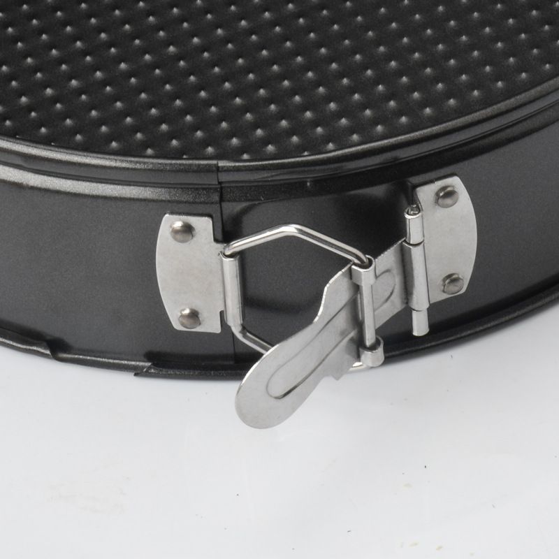 Stainless steel spring baking tray with detachable base and non-stick surface, designed for pretend play with baby and kids' toy kitchen accessories.
