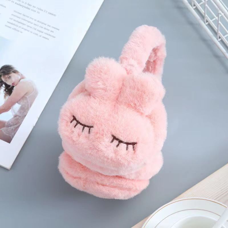 Plush fluffy pink foldable ear muffs for women and kids, cold weather ear warmer by Everything Baby, suitable for winter warmth.
