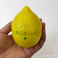 Cute lemon-shaped cartoon kitchen timer from Everything Baby, designed for fun and practical use in nursing and feeding routines.