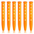 Lightweight aluminum U-shaped snow and sand tent stakes for camping and outdoor activities, suitable for camping, hiking, and backpacking.