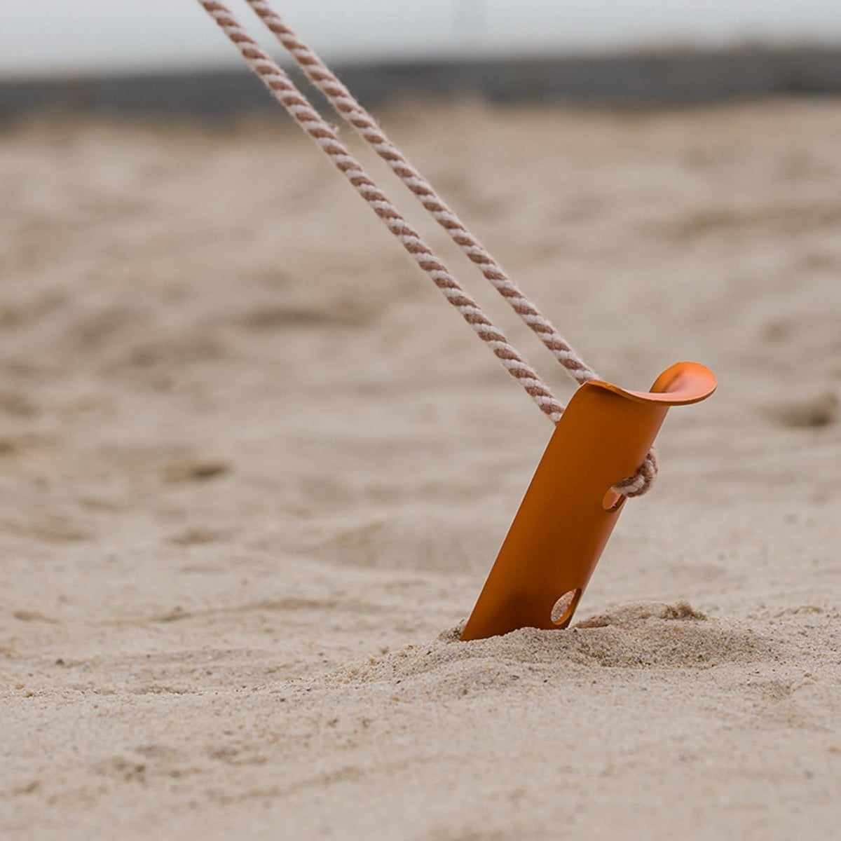 Lightweight aluminum snow and sand tent stakes with U-shaped design for camping and outdoor adventures.