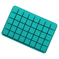 Silicone square chocolate mold from Everything Baby, ideal for making pretend play candies and ice cubes for kids' pretend kitchen.
