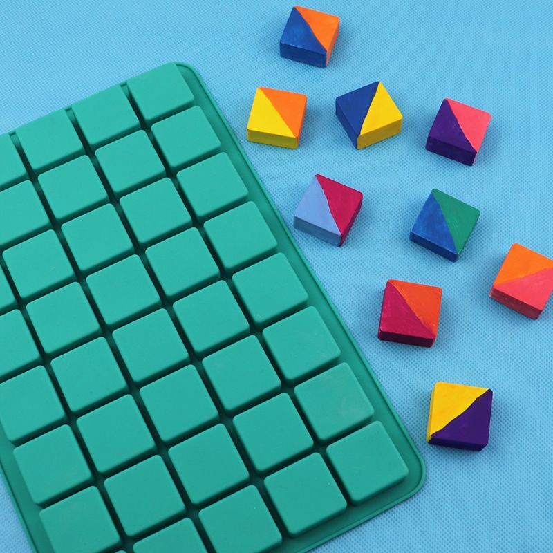 Square silicone chocolate mold by Everything Baby for candy, ice cubes, and baking, featuring a grid design for pretend play.