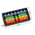 7 gear abacus mental arithmetic toy for kids, colorful educational math learning tool from Everything Baby on a changing table.