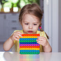 Colorful silicone bubble sensing toy for children and adults, designed for sensory play and outdoor fun, by Everything Baby.