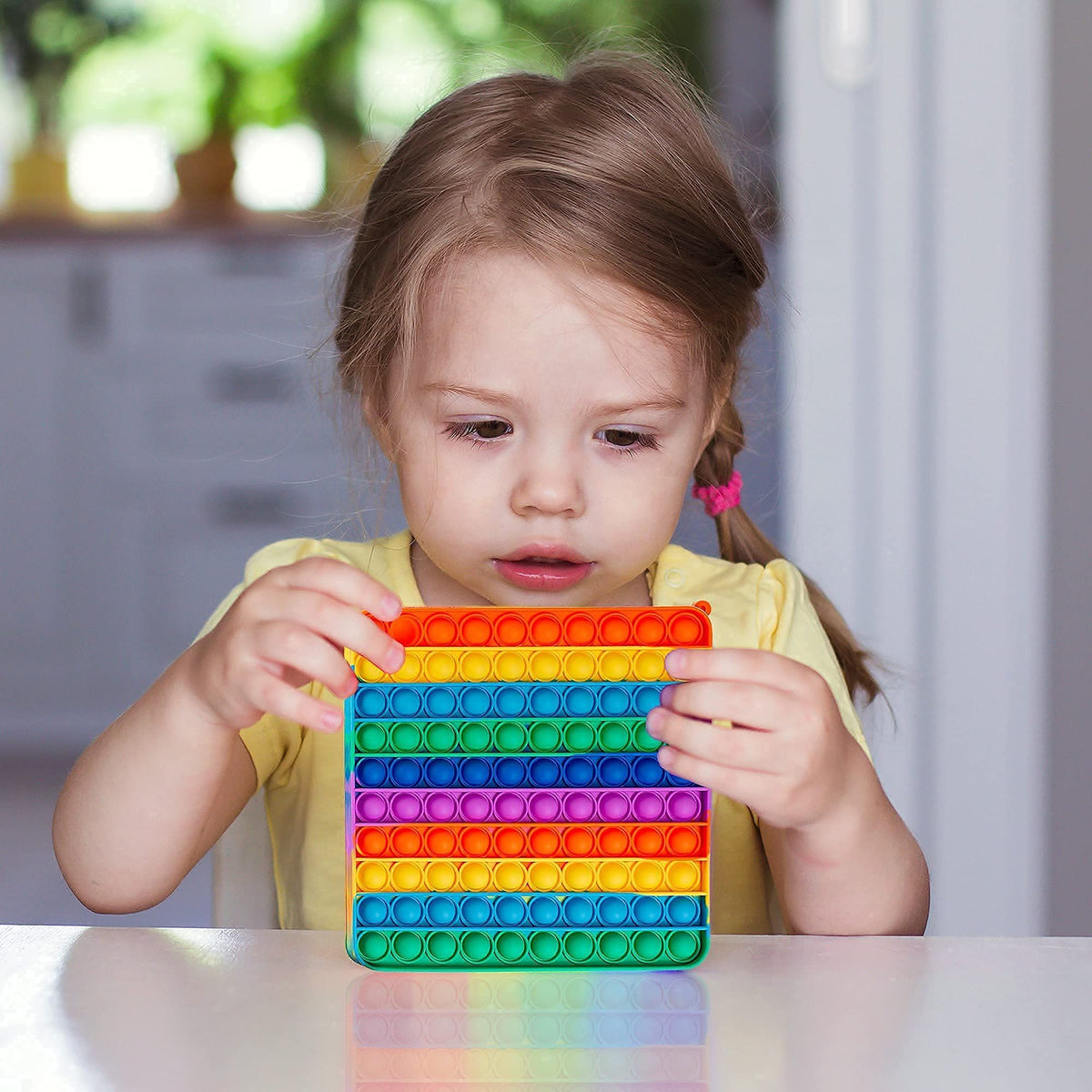 Colorful silicone bubble sensing toy for children and adults, designed for sensory play and outdoor fun, by Everything Baby.
