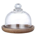 Mini glass dessert dome with base, decorative cake tray for display or pretend play, suitable for kitchen or toy collection.
