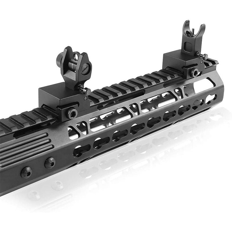 Foldable flat-top co-witness flip-up iron sights with front and rear sight dots, compatible as backup sights for outdoor play equipment.