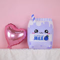 Soft plush blueberry milk-themed toy pillow from Everything Baby, featuring a cute, cartoon-style stuffed animal for kids' comfort.
