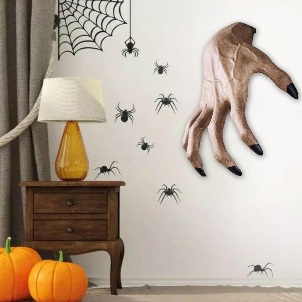Realistic life-size Halloween skeleton hands made of resin, perfect for spooky pretend play and haunted house decorations.