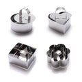 Set of four stainless steel 3D cake molds with pushers and lifters, ideal for baking cupcakes, mousse, and creative cake decorating.