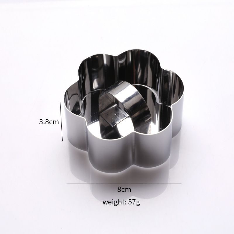 Stainless steel 3D cake molds with pusher lifter, set of 4, for baking cupcakes, mousse, and creative cake decorating.